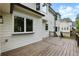 Wood deck with view of the backyard and exterior of the home at 12230 Asbury Park Dr, Roswell, GA 30075