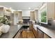 Modern kitchen featuring island, stainless steel appliances, and hardwood flooring at 12230 Asbury Park Dr, Roswell, GA 30075