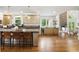 Spacious kitchen with an island, stainless steel appliances, and hardwood flooring at 12230 Asbury Park Dr, Roswell, GA 30075