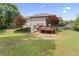 Spacious backyard features a deck, offering great space for outdoor activities at 129 Crown Walk, Mcdonough, GA 30253