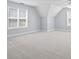 Spacious bedroom with vaulted ceiling, neutral carpet, and lots of natural light at 129 Crown Walk, Mcdonough, GA 30253