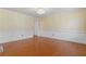 Formal dining room featuring hardwood floors, elegant lighting, and wainscoting at 129 Crown Walk, Mcdonough, GA 30253