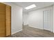 Neutral hallway with updated vinyl floors, new paint, and closet doors at 129 Crown Walk, Mcdonough, GA 30253