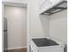Kitchen featuring white cabinetry and appliances, ideal for cooking and meal preparation at 129 Crown Walk, Mcdonough, GA 30253