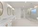 Bathroom with double sink vanity, shower with glass door and luxurious soaking tub at 3735 Tamiami Trl, Cumming, GA 30041