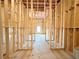 Unfinished basement with exposed framing, insulation, and concrete floor, ready for customization and finishing at 5342 Legacy Trl, Douglasville, GA 30135
