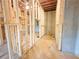 Unfinished basement with exposed framing, insulation, and concrete floor, ready for customization and finishing at 5342 Legacy Trl, Douglasville, GA 30135