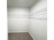 Empty walk-in closet with wire shelving at 5342 Legacy Trl, Douglasville, GA 30135