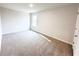 A naturally lit bedroom with carpet at 5547 Bent Grass Way, Douglasville, GA 30135