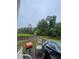 View from the deck of fenced backyard and lush green space offering privacy at 582 Georgia Cir, Loganville, GA 30052