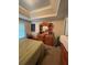 Bedroom with a wooden dresser and a large window at 582 Georgia Cir, Loganville, GA 30052