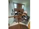 View from the staircase to a large living room featuring tall ceilings and lots of natural light at 582 Georgia Cir, Loganville, GA 30052