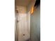 Shower with glass door and shower head at 582 Georgia Cir, Loganville, GA 30052