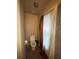 Bathroom with standard toilet, tile floors, and shower with curtains at 582 Georgia Cir, Loganville, GA 30052