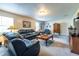Spacious living room with plush seating, fireplace, and ample natural light at 1102 Waverly Dr, Lawrenceville, GA 30046
