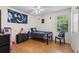 Bedroom with laminate floor, a window, a single bed and purple chair at 1154 Pinebrook Rd, Auburn, GA 30011