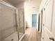 The bathroom features a modern glass shower and neutral flooring at 5295 Greenway Dr, Villa Rica, GA 30180