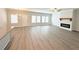 Spacious living room with lots of natural light, neutral paint, and fireplace at 5295 Greenway Dr, Villa Rica, GA 30180