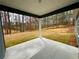 Covered patio with ample space, ideal for outdoor seating and enjoying the backyard view at 5295 Greenway Dr, Villa Rica, GA 30180