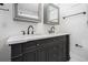 Bathroom with marble countertop and dual sinks with oil rubbed bronze faucets at 1228 Ladd Sw St, Atlanta, GA 30310