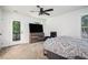 Bright bedroom with a ceiling fan and balcony access, perfect for relaxation at 1228 Ladd Sw St, Atlanta, GA 30310