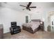 Cozy bedroom featuring a ceiling fan, comfortable furniture and ample natural light at 1228 Ladd Sw St, Atlanta, GA 30310