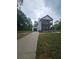 Charming two-story home with a large front yard, two porches, and an attached garage at 1228 Ladd Sw St, Atlanta, GA 30310