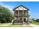 Charming two-story home featuring double front porches at 1228 Ladd Sw St, Atlanta, GA 30310