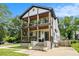Inviting two-story home featuring double front porches and charming architectural details at 1228 Ladd Sw St, Atlanta, GA 30310