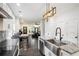 Open kitchen layout with an island and stainless steel appliances at 1228 Ladd Sw St, Atlanta, GA 30310