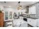 Modern kitchen featuring an island with granite countertop and stainless steel appliances at 1228 Ladd Sw St, Atlanta, GA 30310
