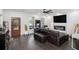 Bright and airy living room with hardwood floors, a fireplace, and large windows at 1228 Ladd Sw St, Atlanta, GA 30310