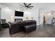 Spacious living room with dark hardwood floors, a sleek fireplace, and modern lighting at 1228 Ladd Sw St, Atlanta, GA 30310