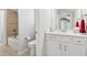 Well-lit bathroom featuring a shower and tub combo and single vanity at 1974 Hosack Sw Hl, Marietta, GA 30064