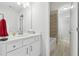 Bathroom featuring a tiled shower and tub combo and a white vanity at 1974 Hosack Sw Hl, Marietta, GA 30064