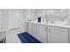 Bright bathroom with double vanity sinks and a view of the walk-in shower at 1974 Hosack Sw Hl, Marietta, GA 30064