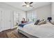 Cozy bedroom with a calming color palette and adjoining bathroom at 1974 Hosack Sw Hl, Marietta, GA 30064