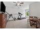 Spacious bonus room with TV, exercise equipment and neutral carpet at 1974 Hosack Sw Hl, Marietta, GA 30064