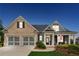 Charming home with a manicured lawn, two-car garage, and inviting front porch at 1974 Hosack Sw Hl, Marietta, GA 30064