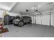 Spacious two car garage with epoxy floor and storage cabinets at 1974 Hosack Sw Hl, Marietta, GA 30064