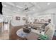 Bright and open living room with hardwood floors, fireplace, and seamless flow into the kitchen and dining area at 1974 Hosack Sw Hl, Marietta, GA 30064