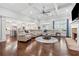 Spacious living room featuring a coffered ceiling, fireplace, and open layout connected to the gourmet kitchen at 1974 Hosack Sw Hl, Marietta, GA 30064