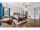 Bright main bedroom featuring a sitting area, hardwood floors, and ensuite bathroom at 1974 Hosack Sw Hl, Marietta, GA 30064
