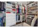 Organized walk-in closet with custom shelving and storage solutions at 1974 Hosack Sw Hl, Marietta, GA 30064