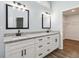 Bathroom features double vanity with granite counters, undermount sinks and modern fixtures at 231 Clarion Rd, Lawrenceville, GA 30043