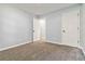 Spacious bedroom with carpeted floors and dual closets for ample storage at 231 Clarion Rd, Lawrenceville, GA 30043