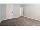 Bedroom boasts neutral paint, carpet, and attached bathroom at 231 Clarion Rd, Lawrenceville, GA 30043
