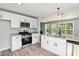 Well-appointed kitchen with granite countertops, stainless appliances, and abundant cabinetry at 231 Clarion Rd, Lawrenceville, GA 30043