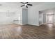 Open-concept room with wood-look floors, modern lighting, and a seamless flow at 231 Clarion Rd, Lawrenceville, GA 30043