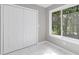 Bedroom with window view and plenty of closet space at 3216 Montheath Ct, Duluth, GA 30096